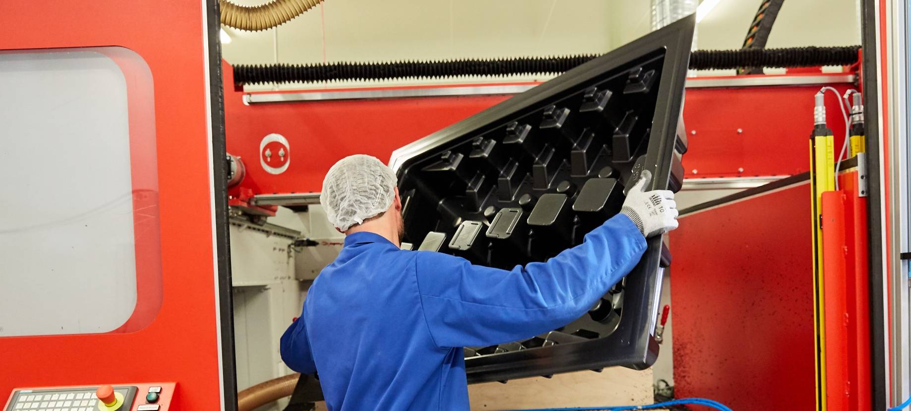 Plastic thermoforming company, thermoformed handling tray